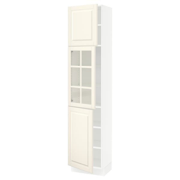 An off-white, tall kitchen cabinet with glass doors and adjustable shelves.