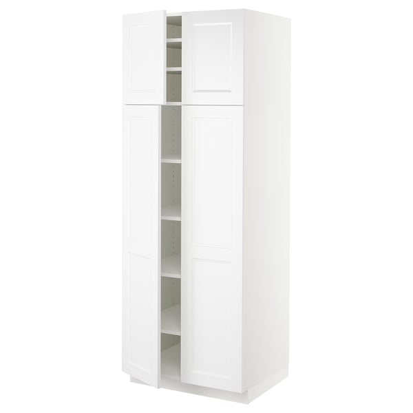 White SEKTION kitchen cabinet with multiple shelves by IKEA.