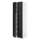 SEKTION tall white cabinet with black stained wood doors featuring bevelled edges.