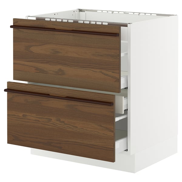 A modern SEKTION kitchen cabinet with dark brown wood drawers featuring solid wood handles.