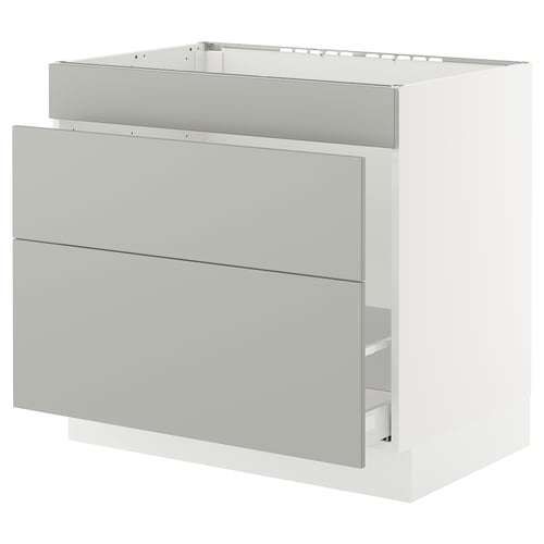 Modern light grey ikea SEKTION kitchen cabinet with smooth drawers.