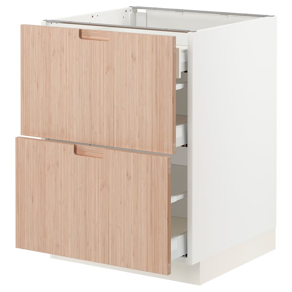 Modern kitchen cabinet with light wooden drawers, sleek handles, and white frame.