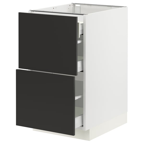 SEKTION white kitchen cabinet with black drawers, sleek modern design, full-extension drawers.