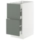 Modern kitchen cabinet with gray-green drawers and white base, sleek design.