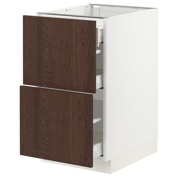An ikea SEKTION kitchen cabinet with dark brown wood grain drawers and a white base.
