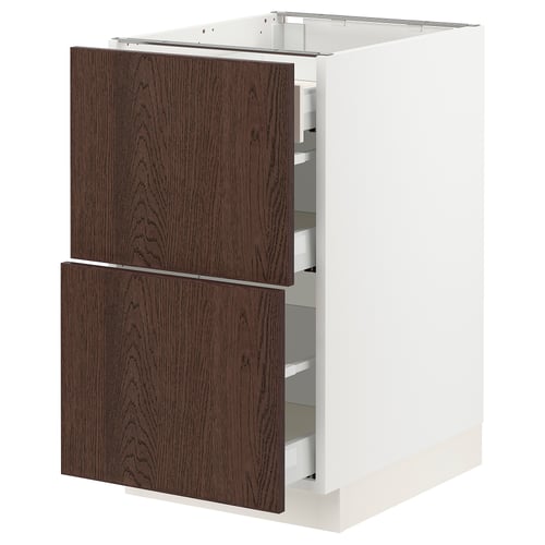 An ikea SEKTION kitchen cabinet with dark brown wood grain drawers and a white base.