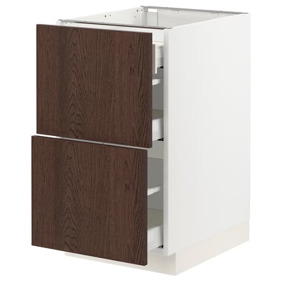 An ikea SEKTION kitchen cabinet with dark brown wood grain drawers and a white base.