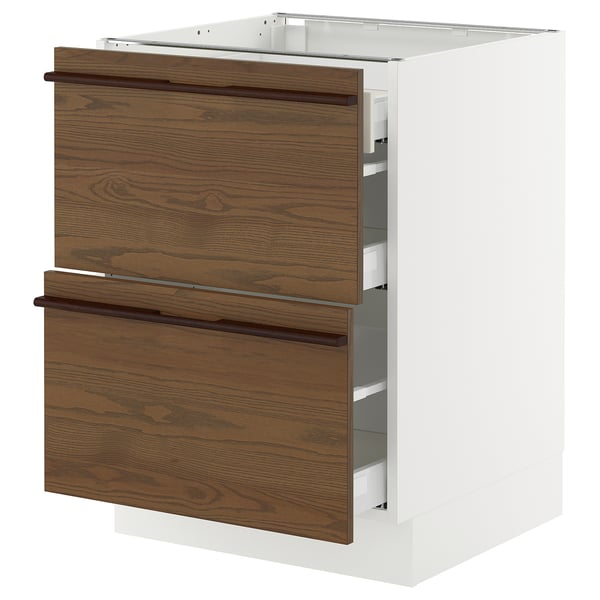 SEKTION kitchen cabinet in white with dark brown wooden drawers, featuring sleek handles and a modern design.