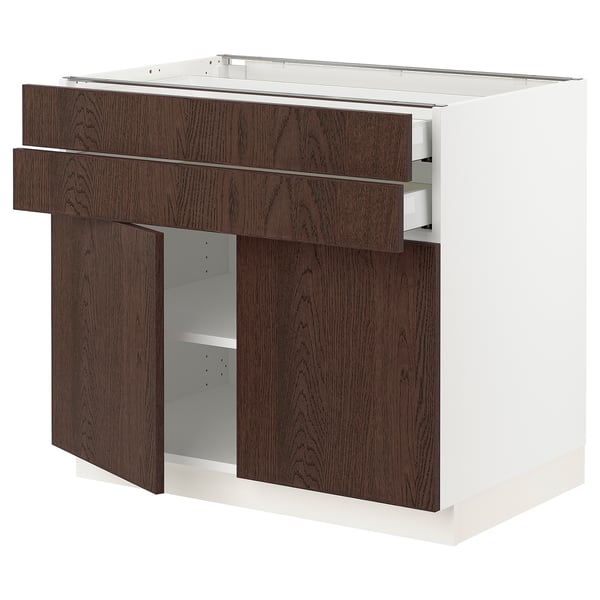 SEKTION kitchen unit in dark brown with adjustable shelves and drawers.