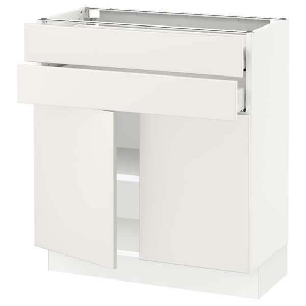 White SEKTION kitchen unit with drawer and shelves.