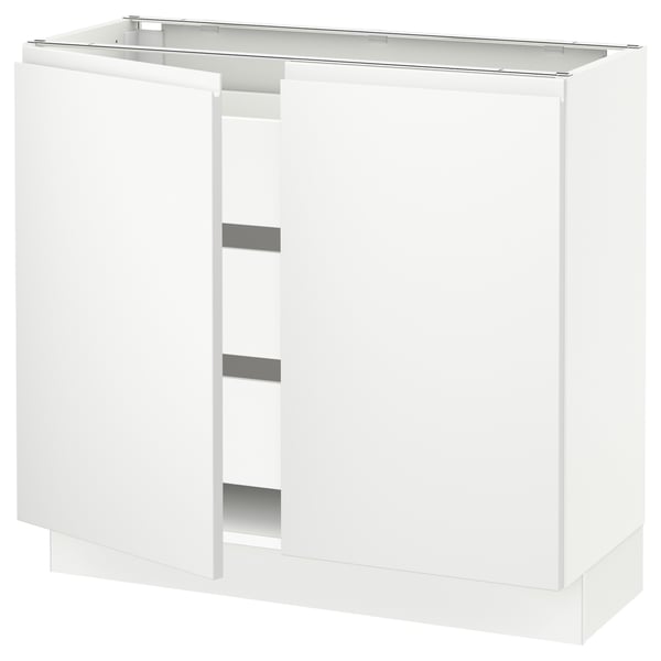 Modern white kitchen cabinet with sleek, minimalist design. A stylish integrated handle and sturdy build.