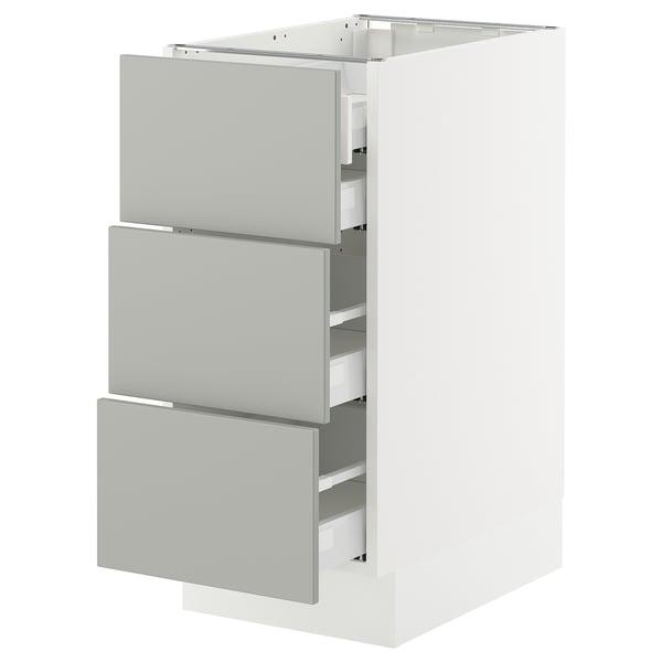 A SEKTION kitchen cabinet in light grey with three drawers. The cabinet is rectangular and has a modern, minimalist design.