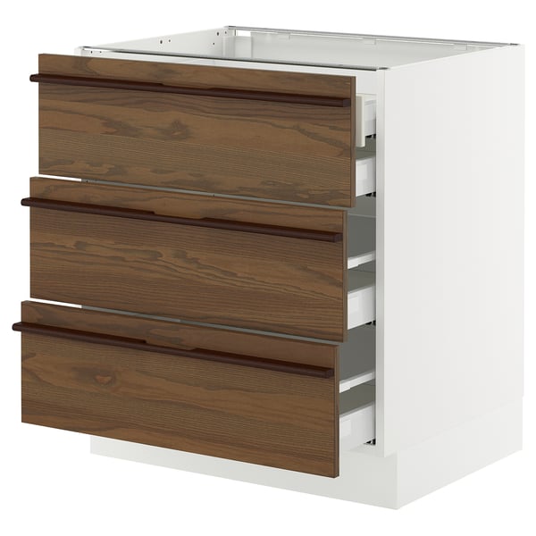 White and brown wooden kitchen drawers, modern design, four-tiered drawers, flat front.