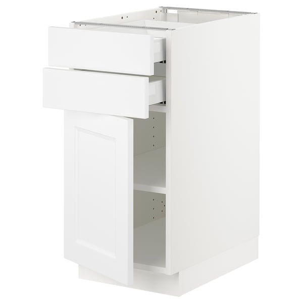 A white SEKTION kitchen cabinet with one open drawer and a door. Its modern, rectangular, with a smooth finish.