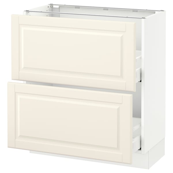 An off-white SEKTION kitchen cabinet with two drawers and a door, featuring a traditional design with bevelled edges.