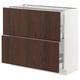 Dark wood cabinet with three shelves, white frame. Modern kitchen storage unit by IKEA.