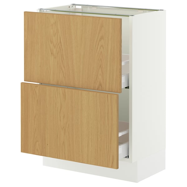 An IKEA SEKTION kitchen cabinet with oak veneer drawers and white frame, featuring sleek design and practical storage.