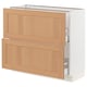 Ikea SEKTION kitchen cabinet in light wood. Has 2 wooden drawers and silver handles. Rectangular shape, simple design.