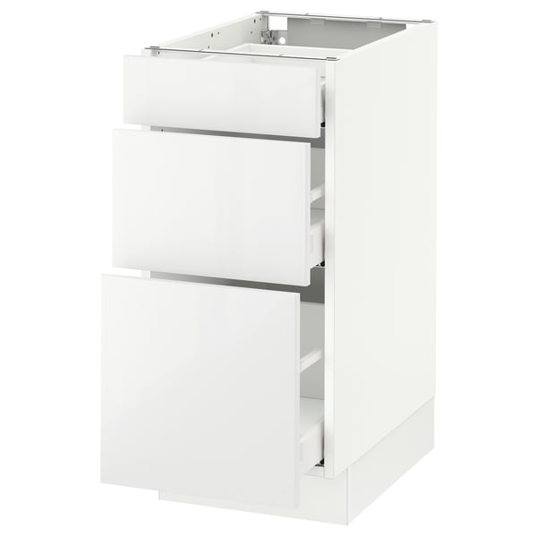 A white SEKTION kitchen cabinet with three drawers. It has a glossy finish and a modern design with smooth-running drawers.