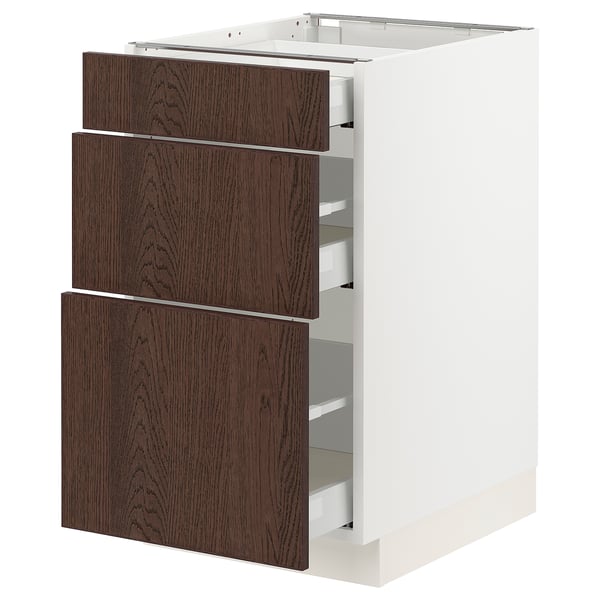 An ikea SEKTION kitchen cabinet with three dark brown wooden drawers and a white base.