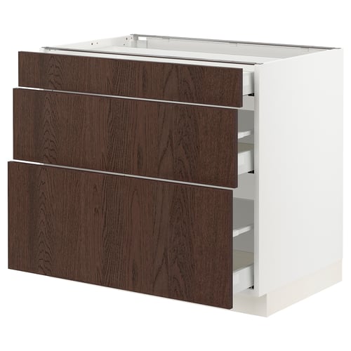 An ikea kitchen cabinet named SEKTION with dark brown sinarp drawers featuring solid wood edges. It has three drawers with soft-close mechanisms.