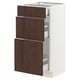 SEKTION kitchen cabinet in white with dark brown wood drawers and metal runners.