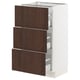 A modern kitchen cabinet with three dark brown wooden drawers, a white base, and metallic drawer handles.