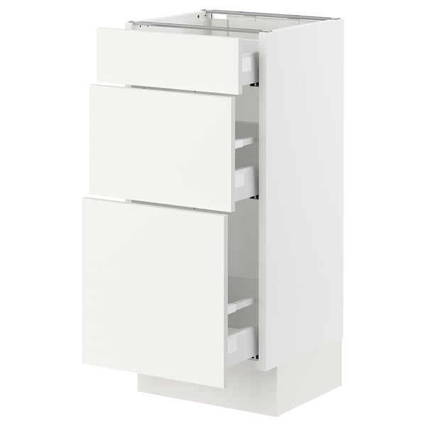 A white ikea SEKTION kitchen cabinet with three drawers.