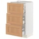 White SEKTION cabinet with 3 oak drawers.