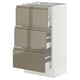 This image shows an ikea SEKTION kitchen unit with three dark grey-brown high gloss drawers and a white cabinet.