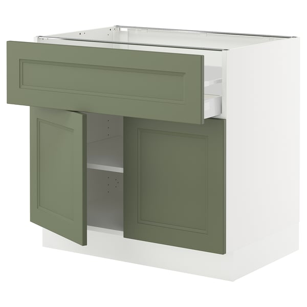 SEKTION kitchen cabinet in green, white top. Drawers and shelves, modern design.
