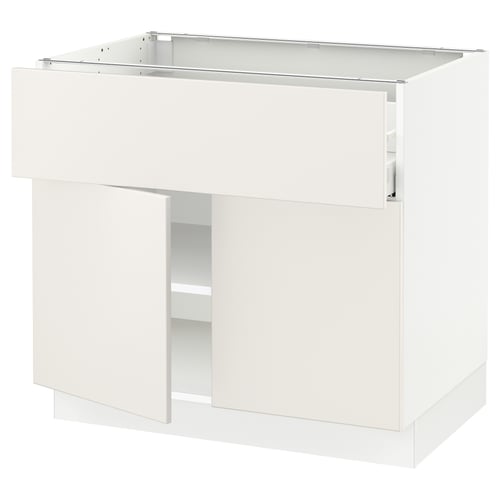 An ikea SEKTION white kitchen cabinet with smooth lines, featuring adjustable shelves and a soft-closing door.