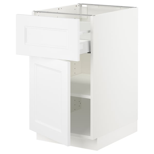 White SEKTION kitchen cabinet. Square shape, flat panel design. One open shelf and one drawer with inset handles.