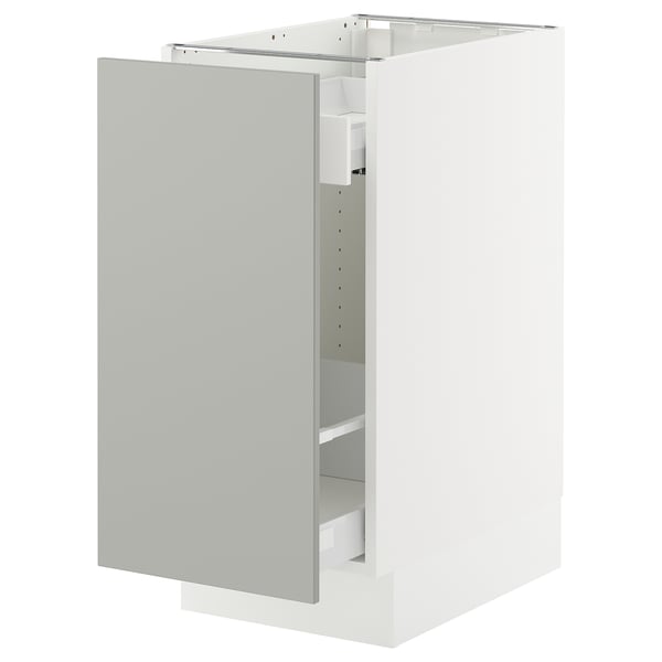A white SEKTION cabinet from IKEA, featuring a modern design with a smooth, light grey door and a sturdy frame construction.