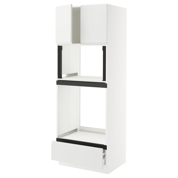 Modern white minimalist ikea SEKTION kitchen cabinet with black handles.