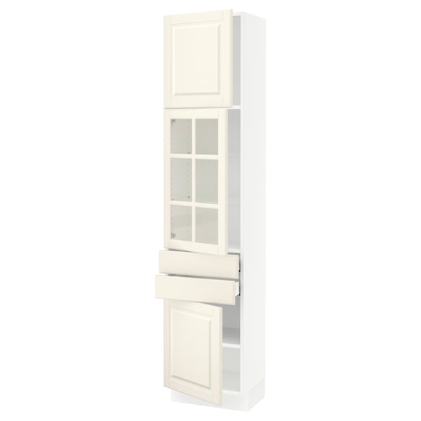 Ikea SEKTION white kitchen cabinet with glass doors in off-white, featuring an open drawer and shelf space.