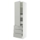 A white SEKTION tall kitchen cabinet with grey drawers, featuring modern design and multiple storage compartments.