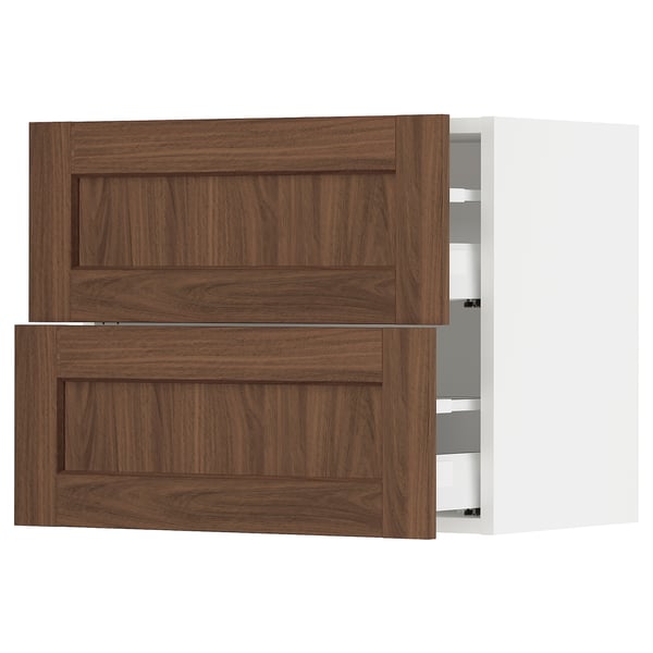 SEKTION kitchen cabinets with walnut finish. It two drawers and an upper cabinet with doors, all having a classic wood look.