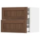 SEKTION kitchen cabinets with walnut finish. It two drawers and an upper cabinet with doors, all having a classic wood look.