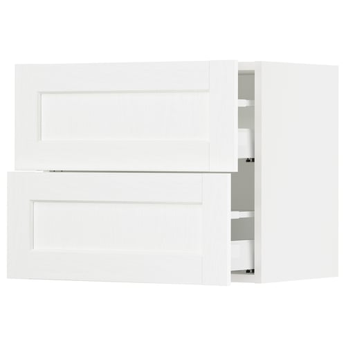 White kitchen cabinets with drawers from the SEKTION line, featuring a sleek design with a subtle grain texture.