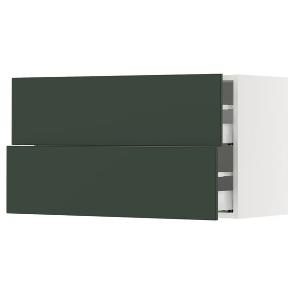 Dark green ikea SEKTION kitchen cabinets with two open drawers, rectangular shape.