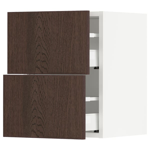 Dark brown oak veneer kitchen cabinets with white interior, featuring drawers and a wooden edge.