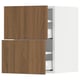 Two-tone kitchen cabinet with wooden doors open revealing shelves. Dark wood doors, white interior.