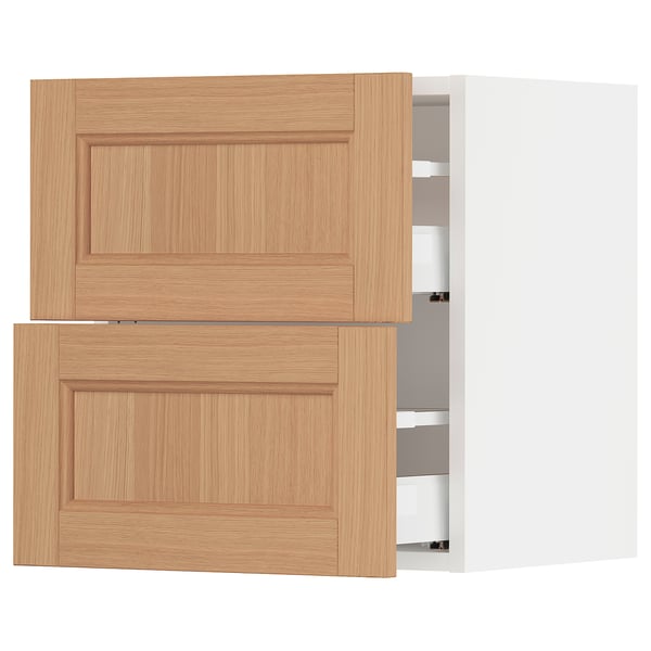 Oak ikea SEKTION kitchen cabinet with wooden drawers and white interior.