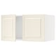 Off-white kitchen cabinet with rectangular doors and bevelled edges.
