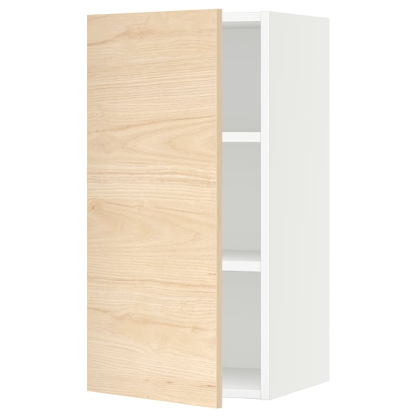 White and wood-toned cabinet, with a door open revealing shelves.