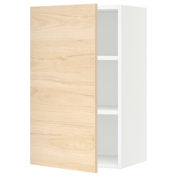 SEKTION kitchen cabinet in light ash wood, white interior, adjustable shelves with soft-closing hinge.