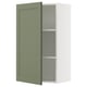 This image shows a green ikea SEKTION wall cabinet with one open door, gray interior, and adjustable shelves.