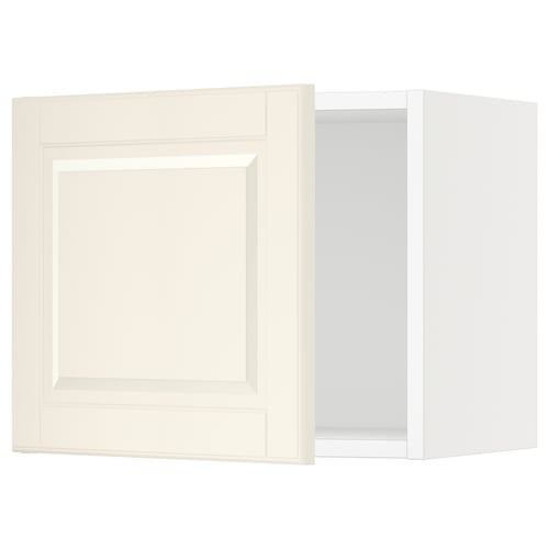 A white, square, wall-mounted kitchen cabinet with a beveled-edge door. It is part of the SEKTION system.
