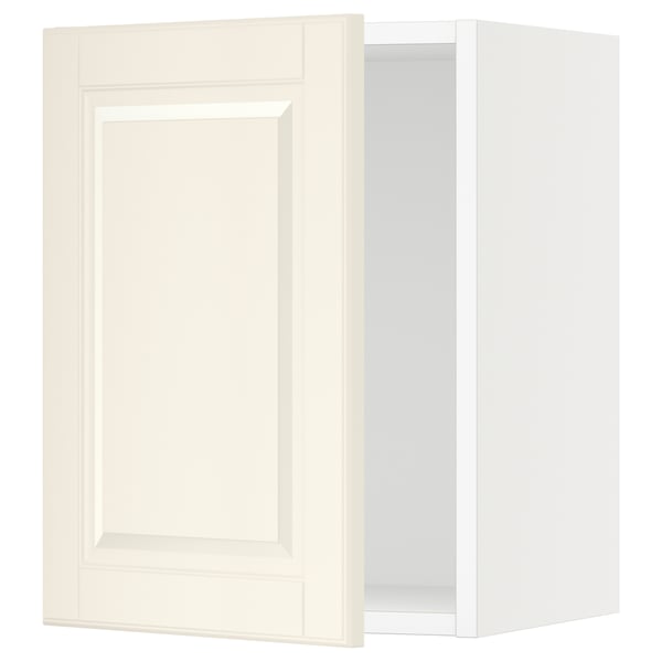 Off-white SEKTION kitchen cabinet with bevelled door, wall-mounted with snap hinges and door damper.
